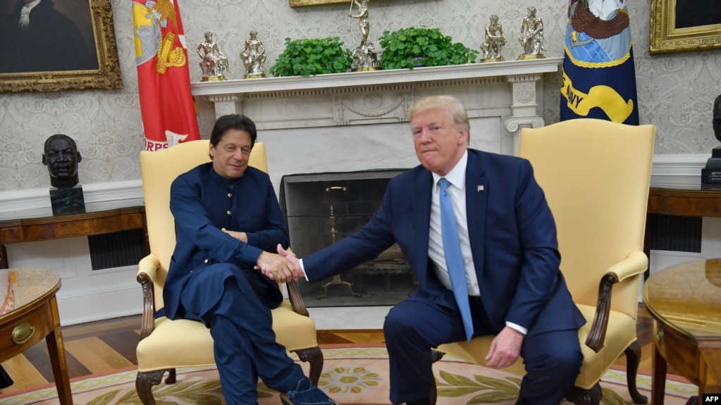 U.S. President Donald Trump (right) shakes hands with Pakistani Prime Minister Imran Khan at the White House on July 22. 