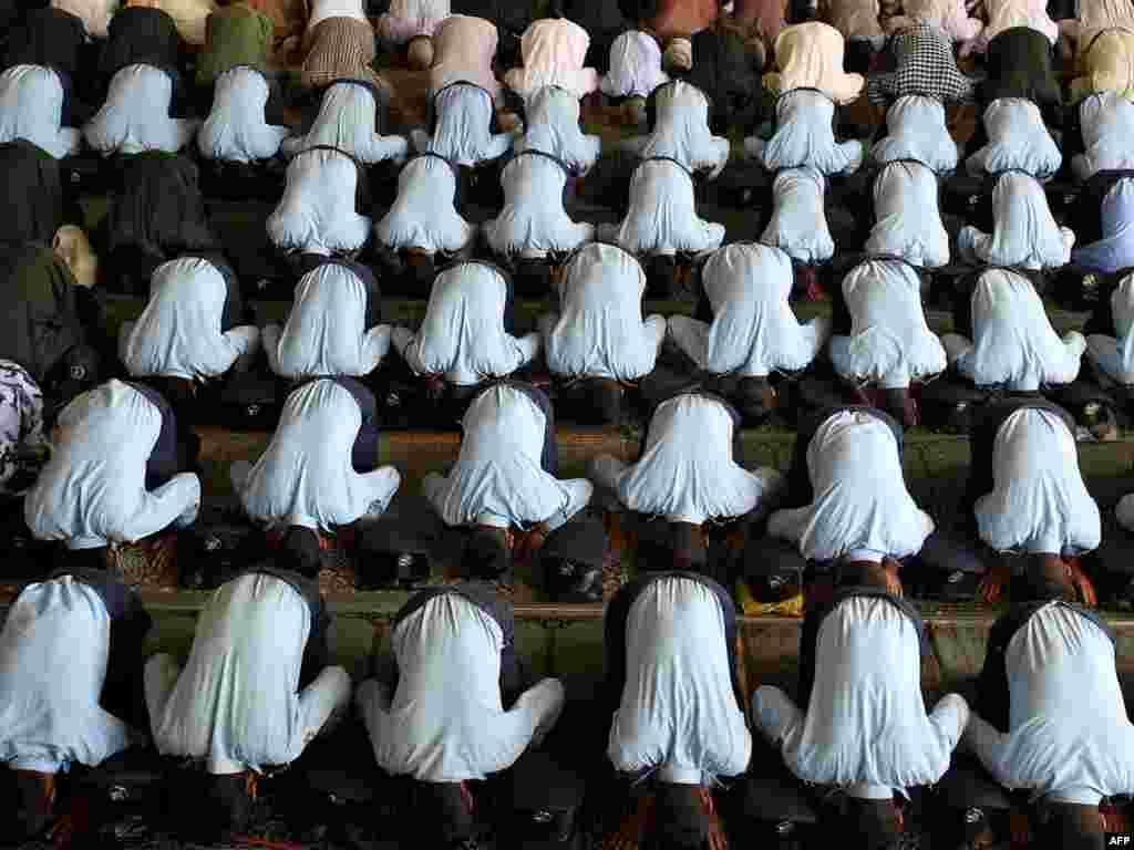 Members of the Iranian military perform the weekly Friday Prayers at Tehran University in the Iranian capital on July 16. Photo by Atta Kenare for AFP