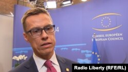 Belgium -- The prime-minister of Finland Oleksandr Stubb on sigining the association agreement at EU Summit, Brussels, 27June2014