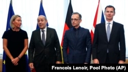 از چپ به راست، فدریکا موگرینی نمایندۀ عالی اتحادیه اروپا در امور خارجی و پالیسی امنیتی، ژان ایو لو دریان وزیر خارجه فرانسه، هایکو ماس وزیر خارجه جرمنی و جرمی هانت وزیر خارجه بریتانیا