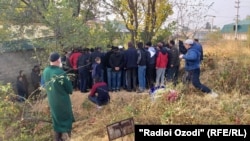 People attend a funeral ceremony on November 7 for one of the border guards killed in an attack the previous day that has been claimed by Islamic State. 