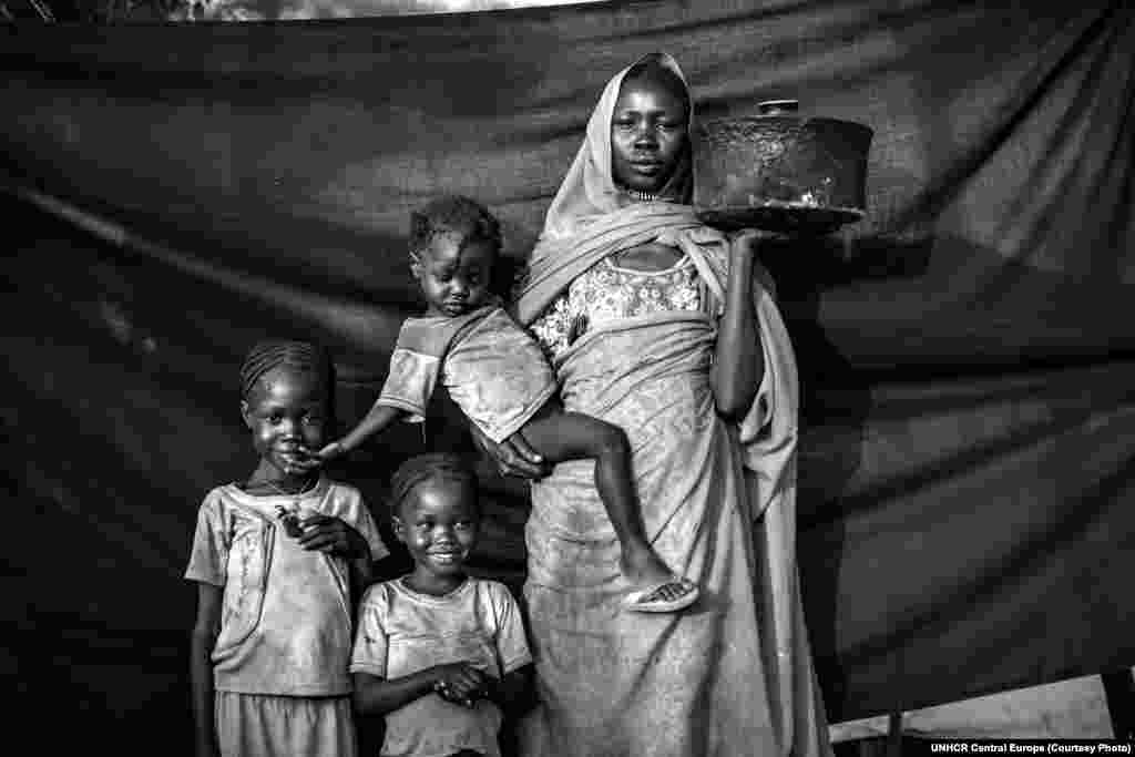 Magbola Alhadi, 20, and her three children fled the village of Bofe in Sudan when it was stormed by soldiers. She brought a pot that was small enough to carry but large enough to cook meals for her daughters during their journey.