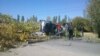 Protesters used trees, cars, and a truck to block the highway in Issyk-Kul Province. Some 400 people were at the site of the roadblock at the height of the protest.