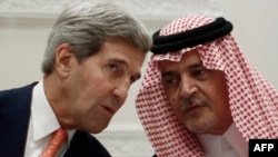 U.S. Secretary of State John Kerry (left) and Saudi Foreign Minister Prince Saud al-Faisal talk during a joint press conference in Riyadh on November 4.