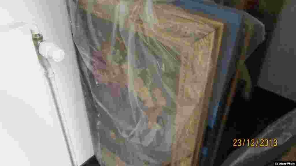 Many of the paintings found in Karimova's Geneva home were wrapped lightly in plastic and stored in a humid attic. 