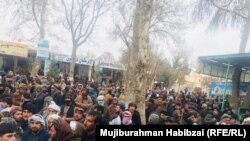 FILE: A protest against civilian casualties in the northern province of Balkh in January.