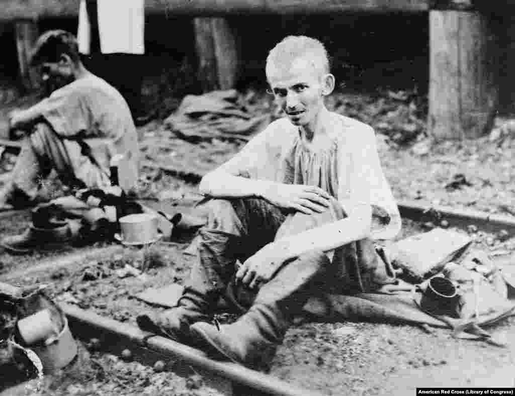 A starving Russian soldier. The context of this picture is unclear, but after Lenin pulled Russia out of World War I, one of the most urgent tasks of the American Red Cross was to tend to Russian troops released from the POW camps of Germany and its WWI allies.