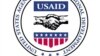 Birleşen Ştatlaryň Halkara ösüş agentliginiň (USAID) nyşany.