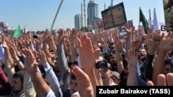 Muslims rally in Grozny's Akhmat Kadyrov Square in support of Rohingya Muslims in Burma on September 4.