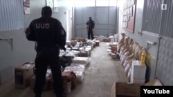 Armenia - A screenshot of official video of security officers finding large stockpiles of food in a villa belonging to retired General Manvel Grigorian, 17 June 2018.