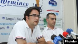 Armenia -- RiseUp Armenia activists Andrias Ghukasian (L) and David Hovanissian at a press conference in Yerevan. 07Aug., 2015