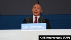 Президент России Владимир Путин выступает с речью на открытии чемпионата мира по футболу в России, Москва, 14 июня 2018 года.