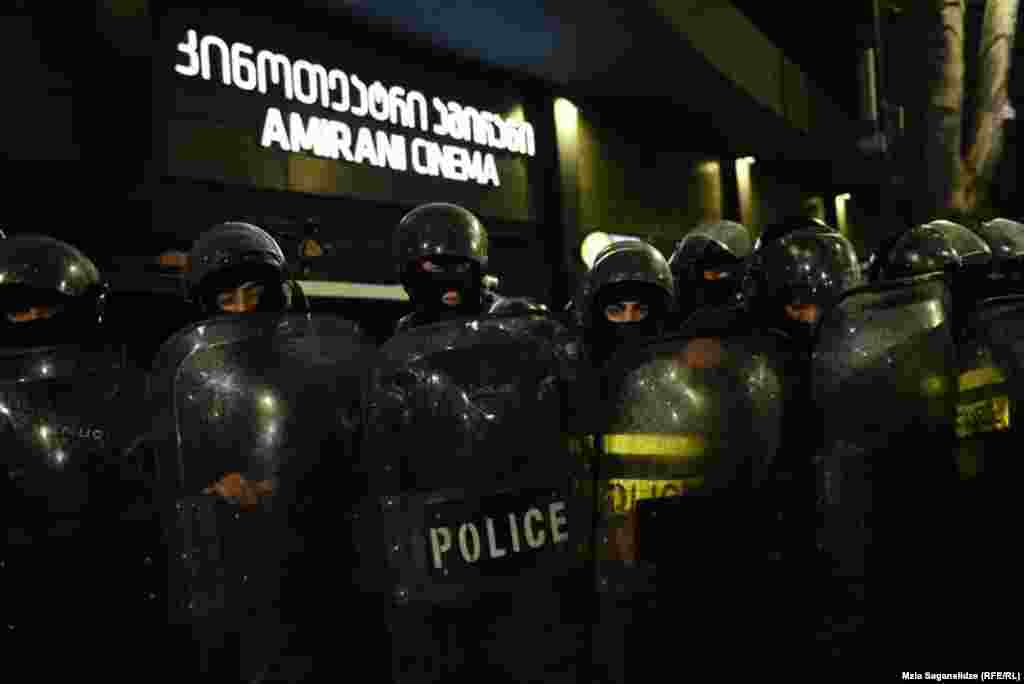 Police guard Tbilisi's Amirani Cinema during the screening. 
