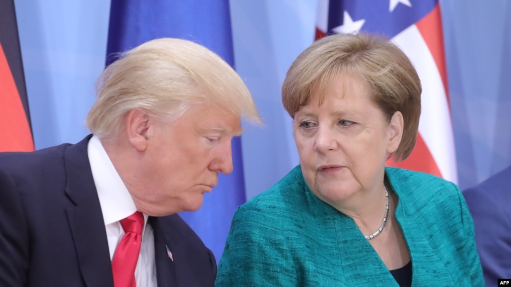 German Chancellor Angela Merkel (right) and U.S. President Donald Trump speak during a panel discussion at the G20 summit in Hamburg last week.