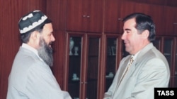 Tajik President Emomali Rahmon (right) meets with Said Abdullo Nuri, the leader of the United Tajik Opposition, in Dushanbe in December 1997.