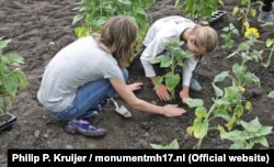 Family members prepare a memorial to victims of flight MH17 in the Netherlands.