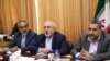 Iranian foreign minister Mohammad Javad Zarif (C) and Iranian MP Heshmatollah Falahatpisheh (R). File photo