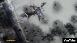 Кадр із відео, відзнятого повітряною розвідкою безпілотної авіації «Армії SOS» над Донецьким аеропортом. Перша воєнна зима