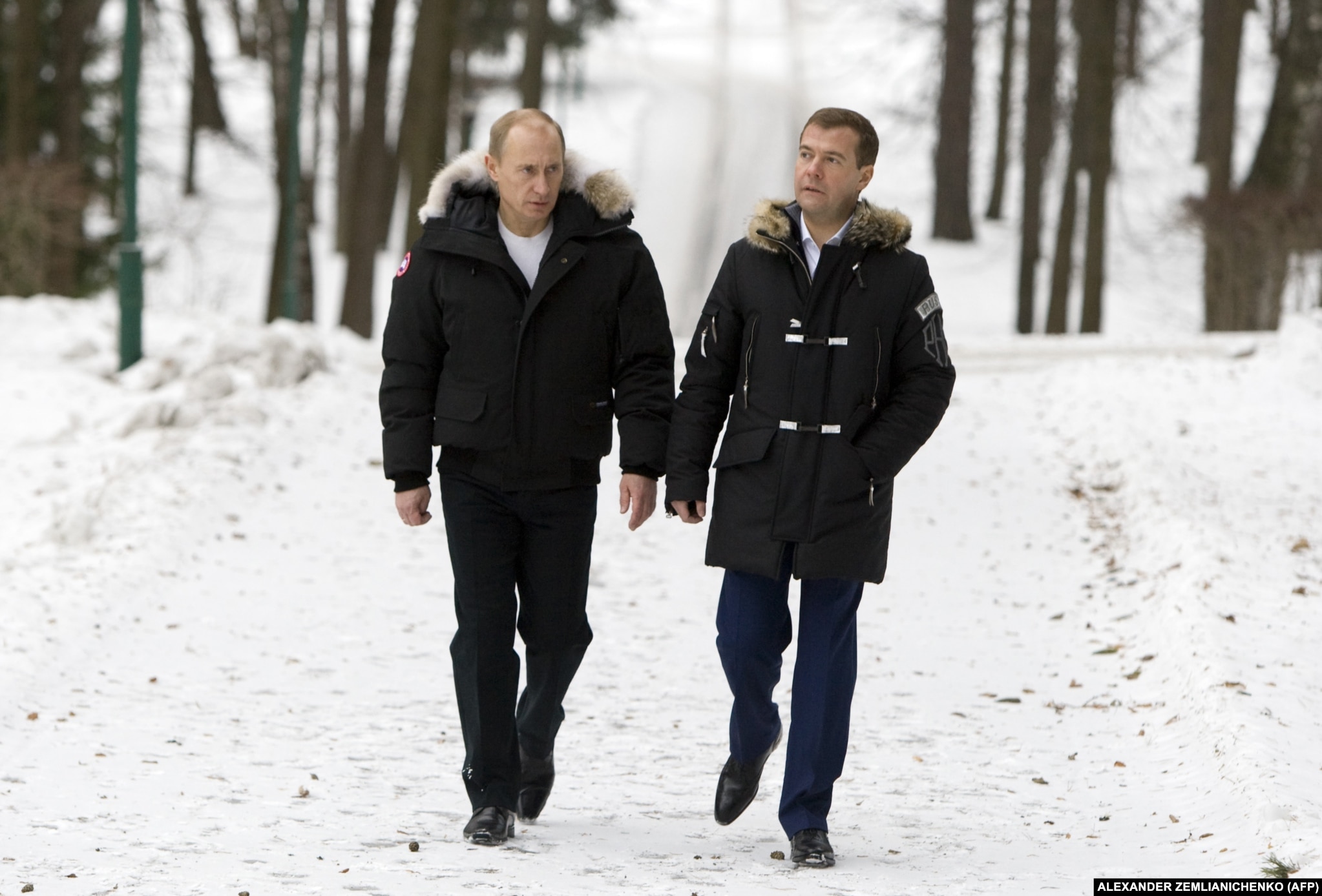 Putin and Medvedev walk outside Moscow on February 29, 2008. When a two-term limit prevented Putin from running for president again in 2008, he named Medvedev, then first deputy prime minister, as his preferred successor.