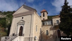 Syria -- A general view shows the exterior of a church in the Armenian Christian town of Kasab after rebel fighters seized it, March 24, 2014