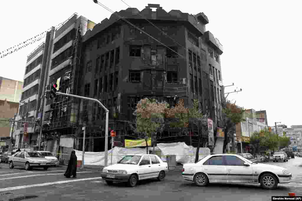 A building in Tehran that was gutted by fire during protests which erupted across Iran after the government announced it would cut subsidies to gasoline on November 15, leading to dramatic increases in prices.&nbsp;
