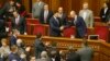 Former Prime Minister Arseniy Yatsenyuk (right, on podium) is included on the list.