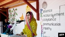Nobel Peace Prize Laureate Malala Yousafzai gives a speech on her 18th birthday, as she opens a new school in Lebanon's Bekaa Valley on July 12.