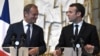 French President Emmanuel Macron (right) and Polish Prime Minister Donald Tusk (file photo)