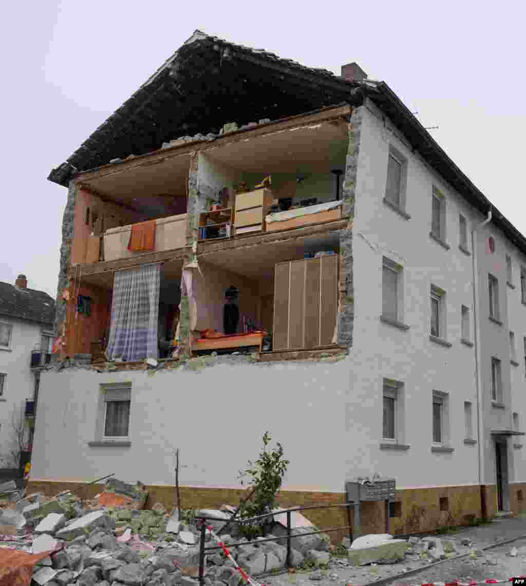 The front of this house in Frankenthal in central Germany fell off without warning and without an obvious reason. The residents were not harmed. (AFP/Uwe Anspach)