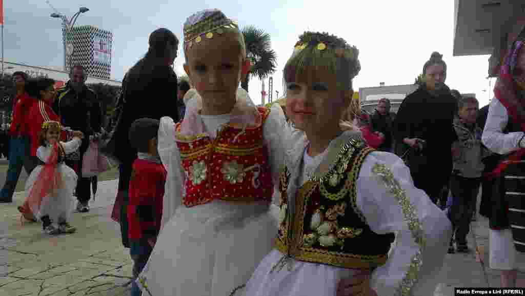 Children wear Albanian national dress in Tirana.