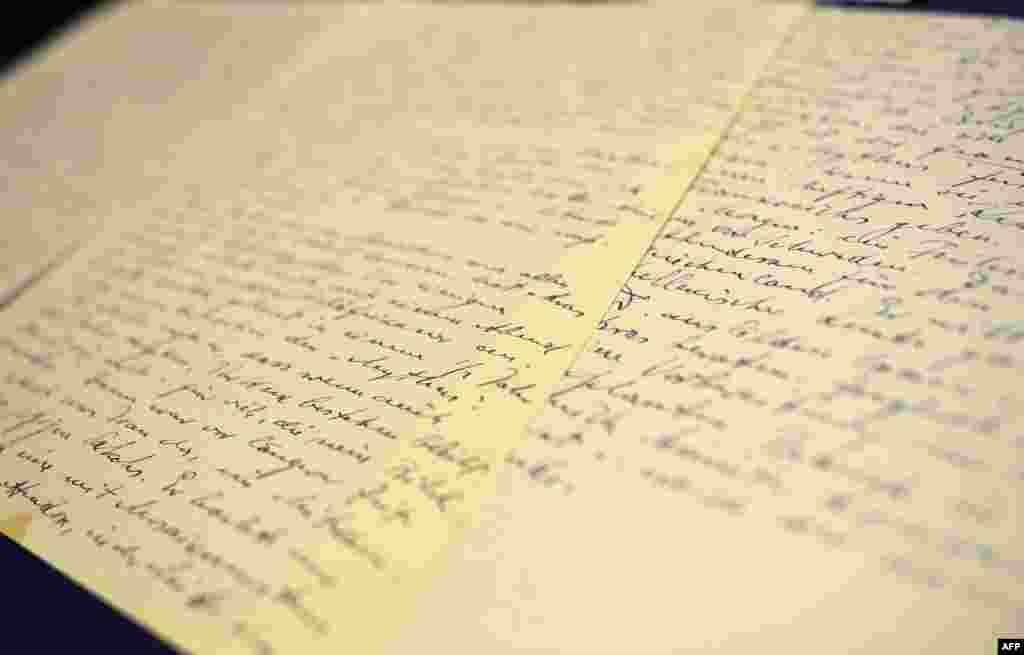 Pages with Alfred Rosenberg&#39;s handwriting are seen during a press conference after the announcement of the discovery of the long-lost &quot;Rosenberg Diary&quot; in Wilmington, Delaware. A close confidant of Adolf Hitler, Rosenberg was one of the most influential and important members of the Third Reich. The 400-page diary disappeared after the Nuremberg trials in 1946, sparking a nearly 70-year hunt that ended on April 5 in the upstate New York town of Lewiston, at the home of an academic named Herbert Richardson. (AFP/Mladen Antonov)