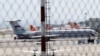 An airplane with the Russian flag is seen at Simon Bolivar International Airport in Caracas on March 24.