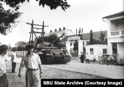 Galeotti's photo of the Soviet tank rolling down a Georgian street, likely Batumi, in 1963.*