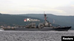Turkey -- The US Navy guided-missile destroyer USS Truxtun sets sail in the Dardanelles straits, on its way to the Black Sea, March 7, 2014