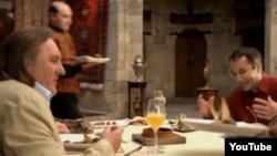Gerard Depardieu (left) raves about the food in the "Azerbaijani Cuisine" television commercial, saying it's "obviously a smart country."