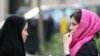 Iran -- police and Basij activists check women for proper dress, Tehran, 22Apr2007