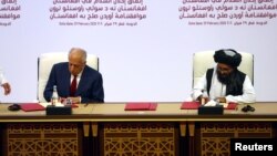 امضای توافقنامه صلح میان نمایندگان امریکا و طالبان در قطر