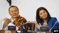 Bhutan's Prime Minister Jigmi Y. Thinley (left) and Costa Rican President Laura Chinchilla at this week's high-level United Nations panel discussion on “Happiness and Well-Being" 