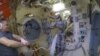 Космонавт Алексей Овчинин и робот Фёдор на борту МКС
