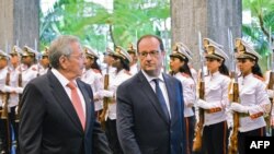 Raul Castro dhe Francois Hollande