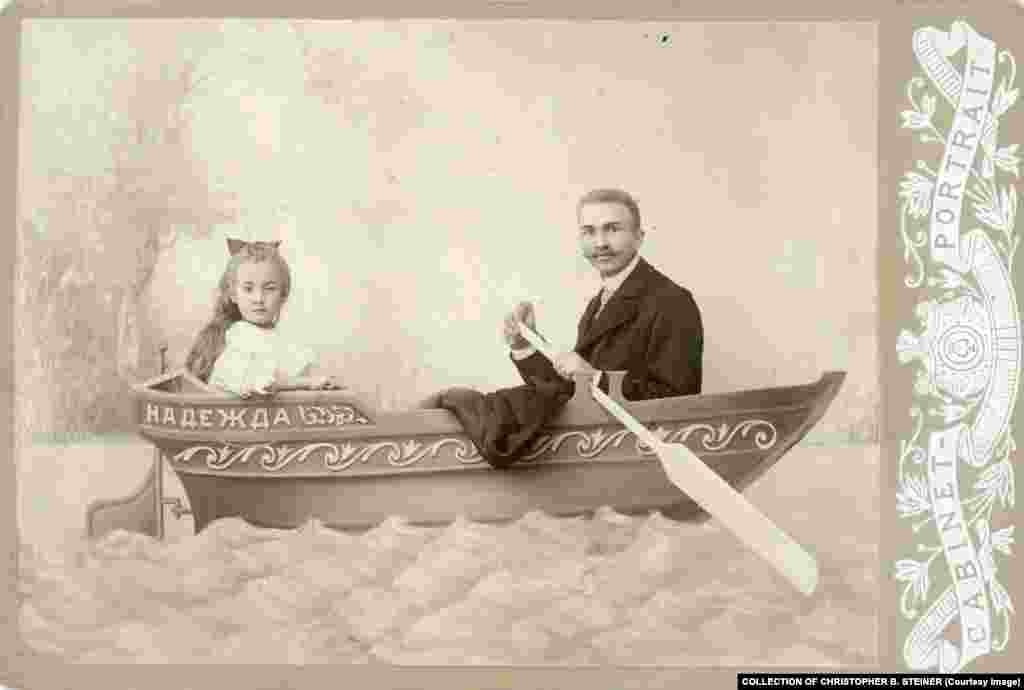 But most photography studios focused their cameras on rowboat scenarios, like this father and daughter in a boat called &quot;Hope.&quot;