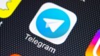 Sankt-Petersburg, Russia, February 9, 2018: Telegram application icon on Apple iPhone X screen close-up. Telegram app icon. Telegram is an online social media network. Social media app