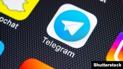 Telegram application icon on Apple iPhone X screen close-up. Telegram app icon. Telegram is the most popular messaging app in Iran. File 