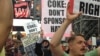 Gay-rights protesters in New York's Times Square call on Coca-Cola to drop its sponsorship ahead of the Winter Olympics in Sochi. (photo courtesy of RUSA LGBT)