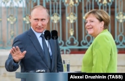 Президент РФ Володимир Путін та канцлер Німеччини Анеґла Меркель