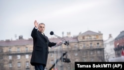 Hungarian Prime Minister Viktor Orban addresses a crowd in Budapest on March 15.