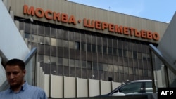 A man walks past the terminal F of Moscow's Sheremetyevo Airport.