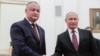 Russian President Vladimir Putin (right) meets with Moldovan President Igor Dodon in Moscow on October 31.