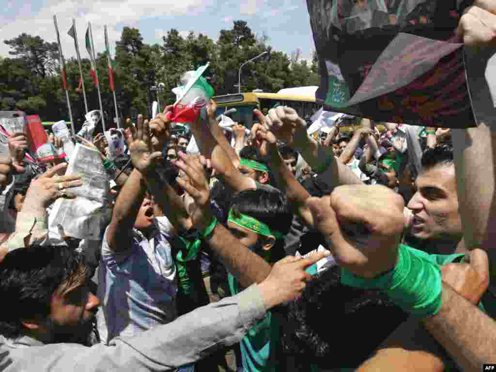 Ahmadinejad and Musavi backers confronted each other outside Tehran University after Friday prayers on June 6.