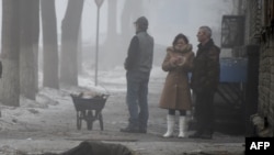 Civilians Suffer, Again, As Shells Rain Down On Donetsk